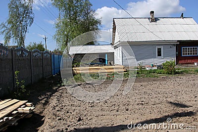 Village. Sunny day. The typical rural courtyard Stock Photo