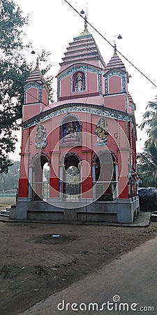 Village temple road religious sentiments faith Stock Photo