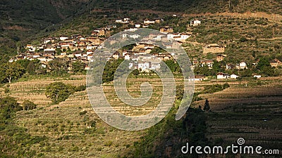 The village, terrace fields,and the green mountain Stock Photo