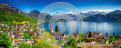 Village Weggis and lake Lucerne surrounded by Swiss Alps Stock Photo