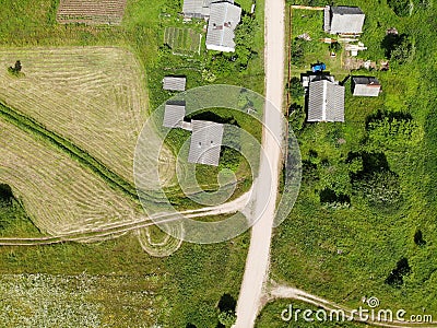 Village with wooden houses. Farming field and garden. Aerial crossroads top down Stock Photo