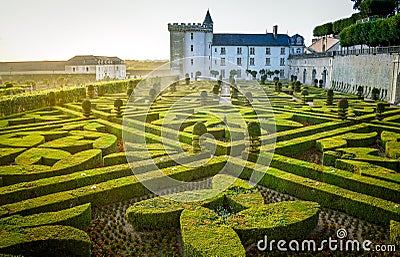 The garden illuminated by 2,000 candles at dusk . Nights of a Thousand Lights at Stock Photo