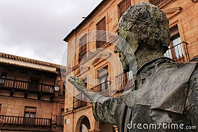 Villanueva de los Infantes square and Don Quixote statue in the foreground Stock Photo