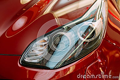 Vilnius Lithuania. Close Left Headlight Of New Red Kia Sportage Editorial Stock Photo