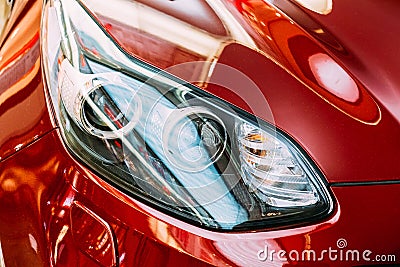 Vilnius Lithuania. Close Left Headlight Of New Red Kia Sportage Editorial Stock Photo