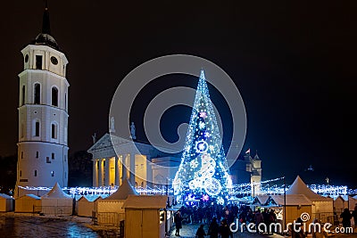 Vilnius, Lithuania - December 02, 2018: Christmas tree and Christmas market at Cathedral Square in Vilnius, Lithuania Editorial Stock Photo