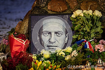 Flowers and candles laid at spontaneous memorial for Russian opposition leader Alexei Navalny Editorial Stock Photo