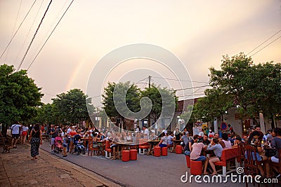 One day during summer, restaurants put their tables on the road in Vinales Editorial Stock Photo