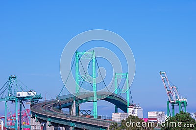 Vincent Thomas suspension bridge and cranes Editorial Stock Photo