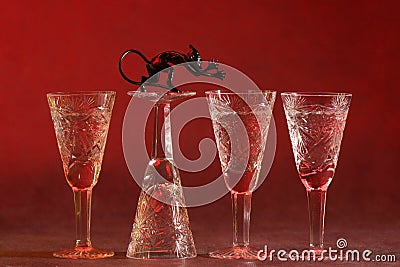 Vine-glases with devil Stock Photo