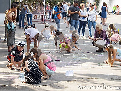 Vinnitsa, Ukraine. 08/24/2019. Children draw on the pavement with chalk Editorial Stock Photo