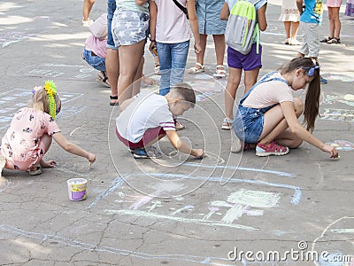 Vinnitsa, Ukraine. 08/24/2019. Children draw on the pavement with chalk Editorial Stock Photo