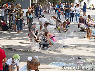 Vinnitsa, Ukraine. 08/24/2019. Children draw on the pavement with chalk Editorial Stock Photo