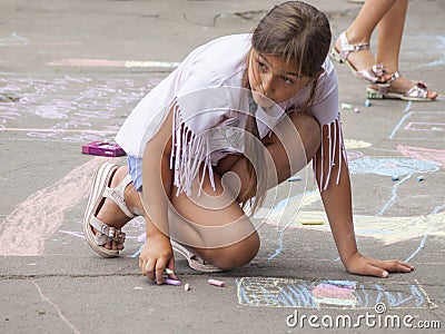 Vinnitsa, Ukraine. 08/24/2019. Children draw on the pavement with chalk Editorial Stock Photo