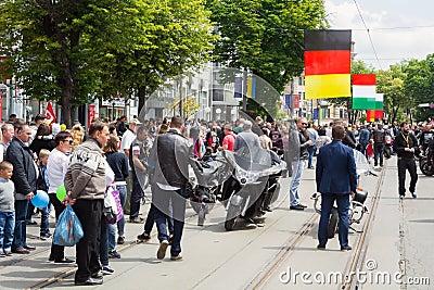 People consider motorcycles, during the rally of bikers, at the celebration of Europe Day Editorial Stock Photo