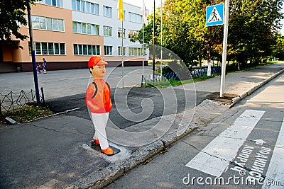 Vinnytsia, Ukraine - August 25, 2017: View of orange plastic mannequin boy. Editorial Stock Photo