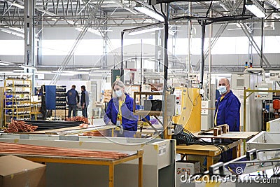 Manufacture of freezers for retail. Refrigeration equipment manufacturing. Editorial Stock Photo