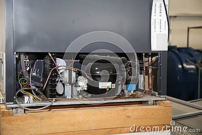 Manufacture of freezers for retail. Refrigeration equipment manufacturing. Editorial Stock Photo