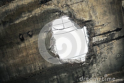 Vintage abandoned damaged house roof with hole in ceiling overlooking cloudy sky Stock Photo