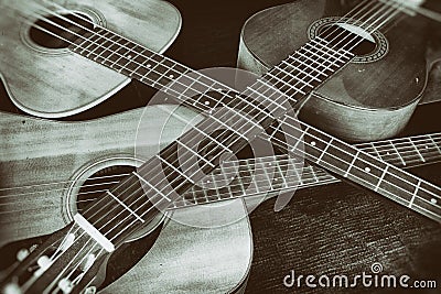 Vintage Acoustic Guitars Crossed Stock Photo