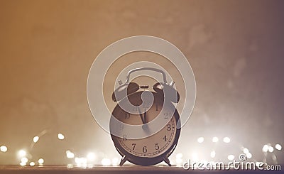 Vintage alarm clock with Fary Lights Stock Photo