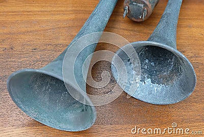 Vintage Alarm Hooter or Car Horn on Wooden Table Stock Photo