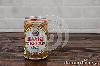 A vintage aluminium can of Haake Beck beer against the brick wall Editorial Stock Photo