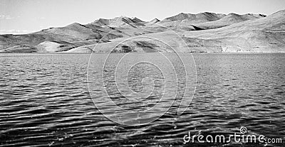 Vintage analogue film photo of deserted mountains over the lake Stock Photo