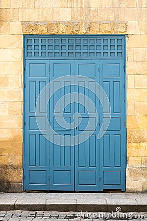 Vintage antique folding wooden decorated blue door Stock Photo