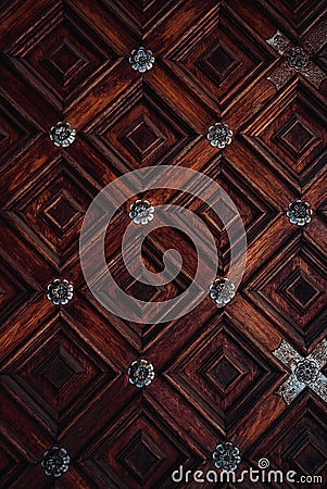 Vintage background with cutted wooden ornament with metal decor Stock Photo