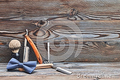 Vintage barber shop tools on wooden background Stock Photo