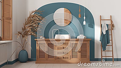 Vintage bathroom in white and blue tones, rattan wooden washbasin, chest of drawers, mirror, towel rack and decor. Parquet and Stock Photo