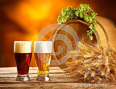 Vintage beer barrel and two glasses. Brewing concept Stock Photo