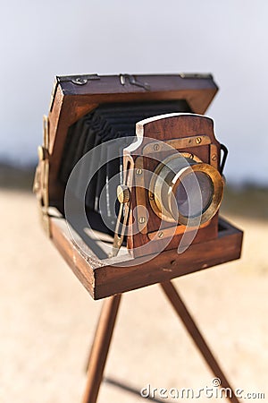 Brihuega, Spain 01/12/2020 Vintage bellows camera with wooden tripod Editorial Stock Photo