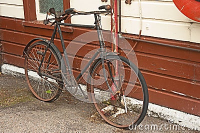 Vintage bicycle decaying Stock Photo