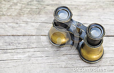 Vintage binocular on wooden background Stock Photo