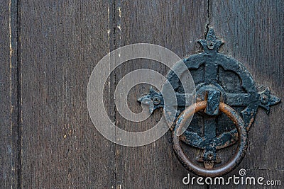 Vintage black door panels with ancient knocker - high quality texture / background Stock Photo