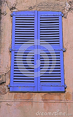 Vintage blue close window with shutters, Provence Stock Photo