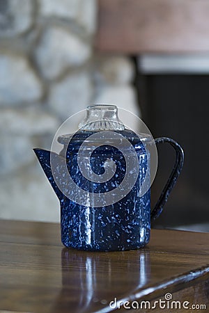 Vintage blue speckled coffee pot Stock Photo