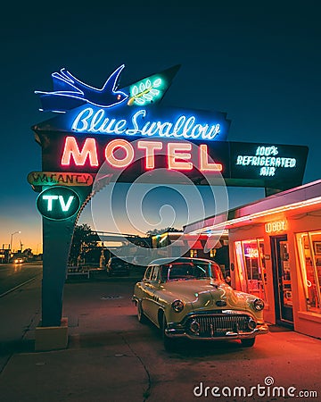 Vintage Blue Swallow Motel retro neon sign, on Route 66 in Tucumcari, New Mexico Editorial Stock Photo