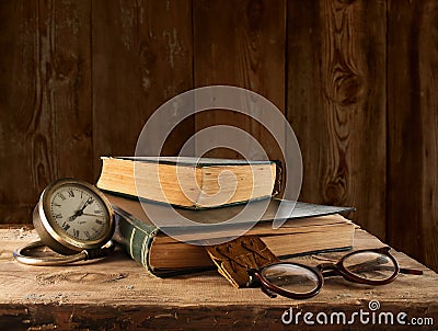 Vintage book, glasses and watches Stock Photo