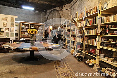 Vintage books for sale in an Old warehouse called Armazem Editorial Stock Photo