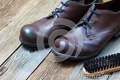 Vintage boots, brush and shoe polish Stock Photo