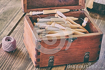 Vintage box of spools for yarn. Coil retro with coiled spindle for spinning wheel Stock Photo