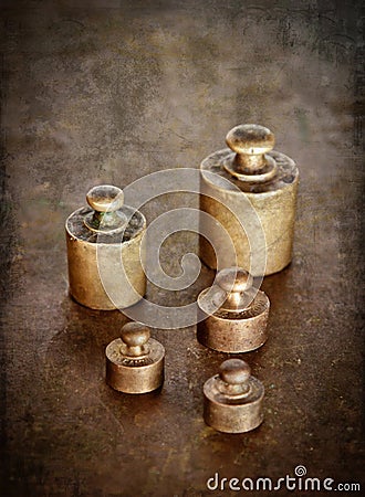 Vintage brass weights Stock Photo