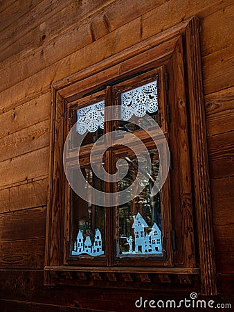 Vintage brown country wooden window. Antique traditional building exterior detail. Travel photo. Retro rustic wood board Stock Photo