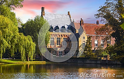 Vintage building lake of love in Minnewater park Bruges Stock Photo