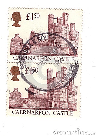 Vintage Caernarfon Castle postage stamps from Great Britain. Editorial Stock Photo
