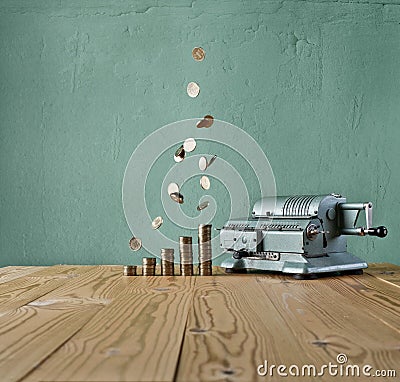Vintage calculator and money rain Stock Photo