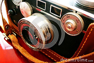 Vintage camera on cherry desk Stock Photo